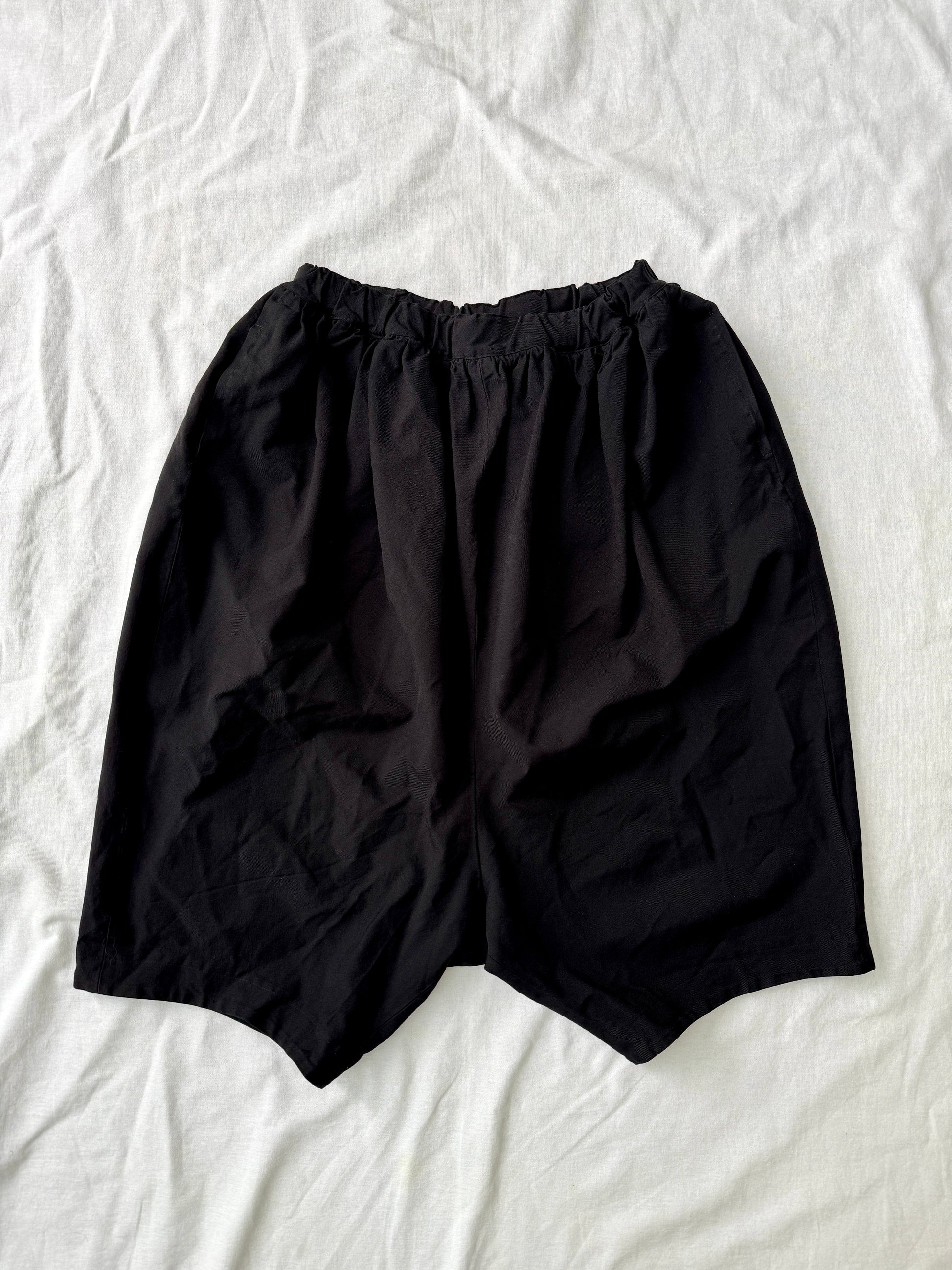 Comme des Garcons BLACK Boiled Polyester Shorts