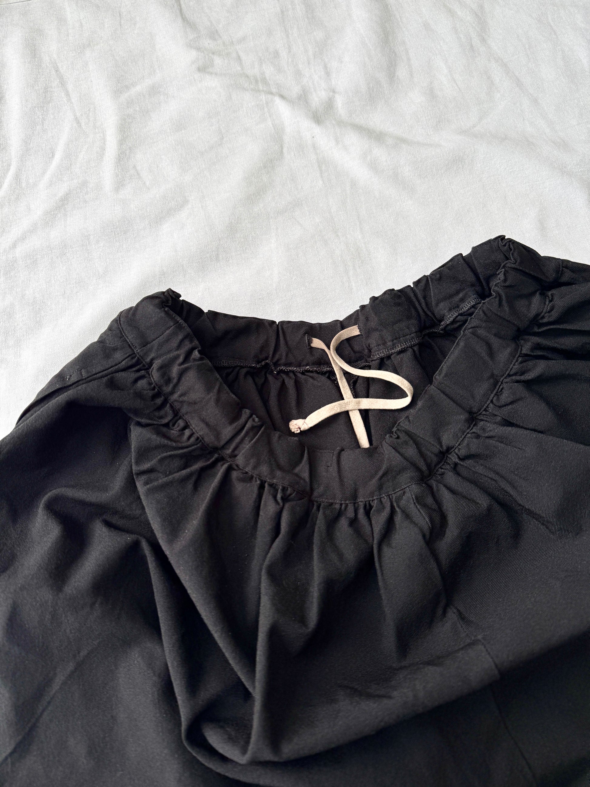 Comme des Garcons BLACK Boiled Polyester Shorts