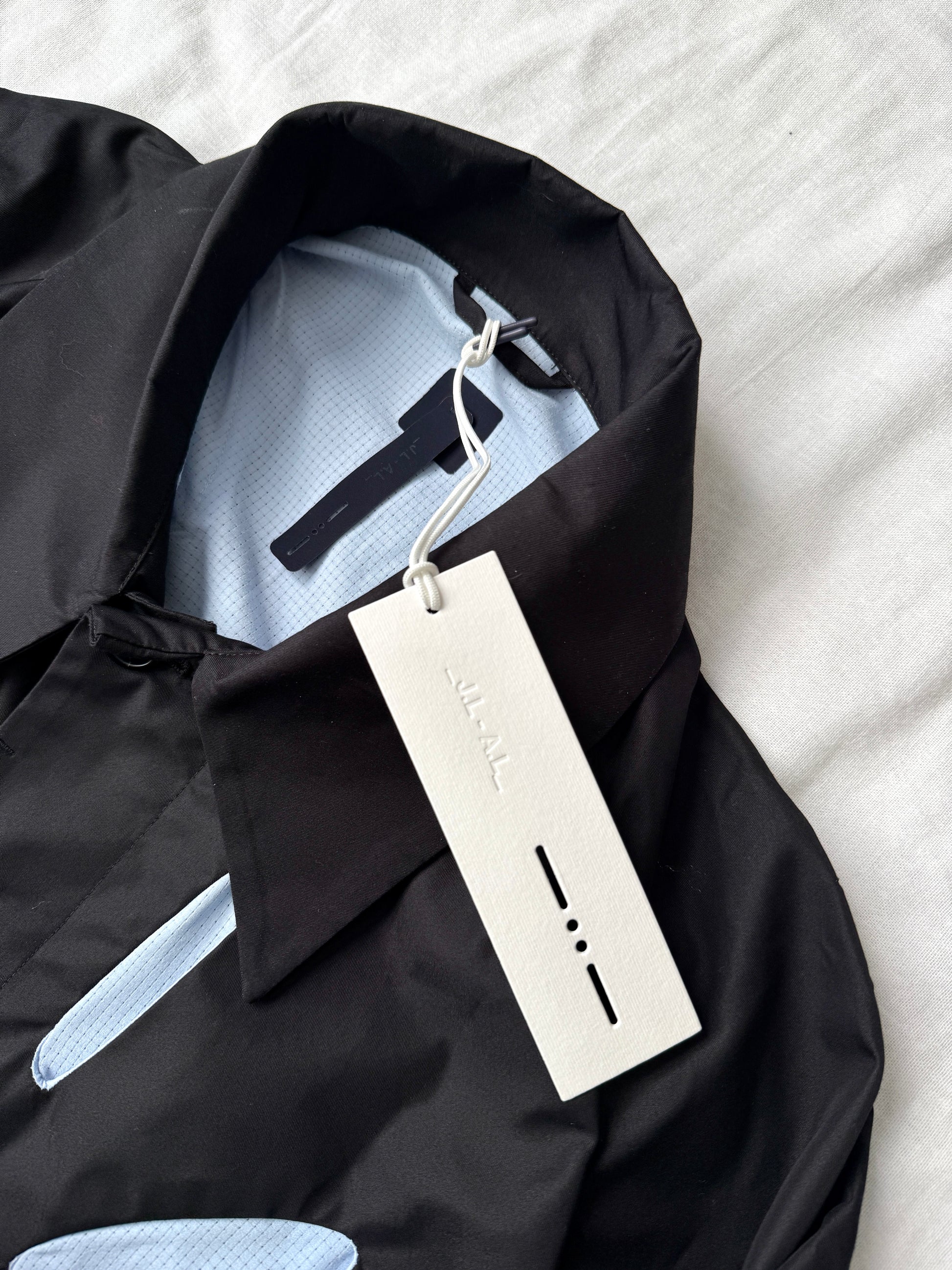 _J.L-A.L_ Aperture Trench Coat