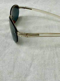 Prada Round Rimless Sunglasses