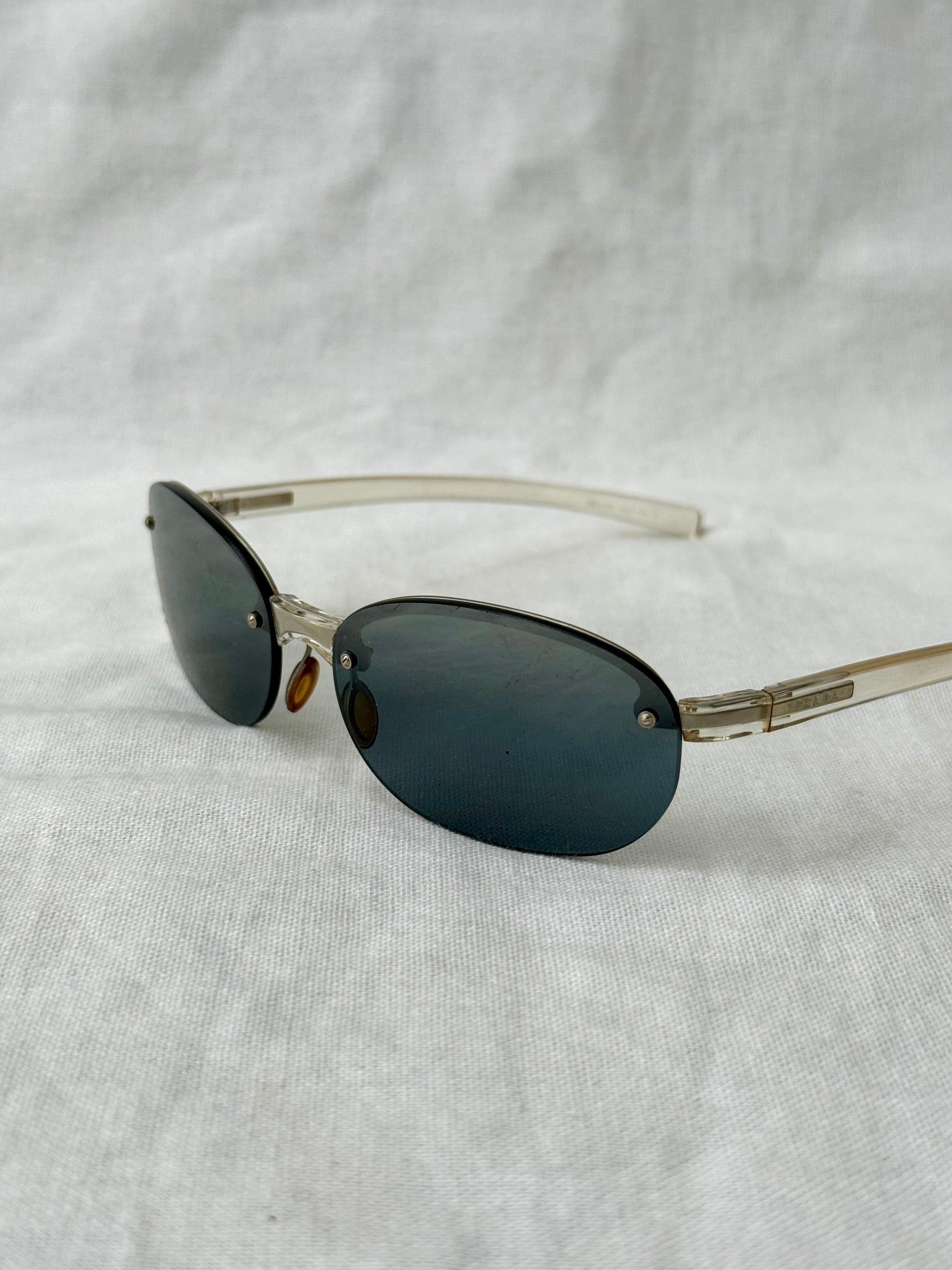 Prada Round Rimless Sunglasses