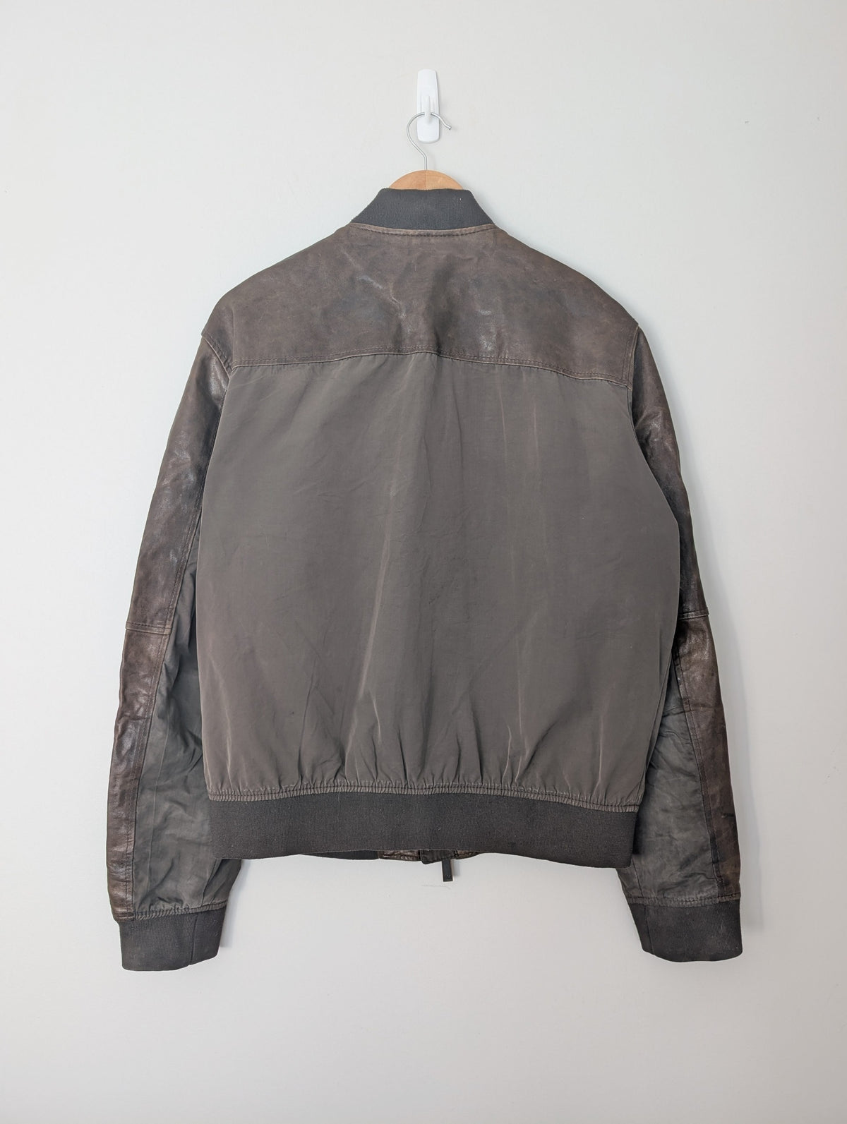 SĀN ARCHIVE GOODS Armani Jeans brown lambskin and polyester patchwork bomber jacket, back view.