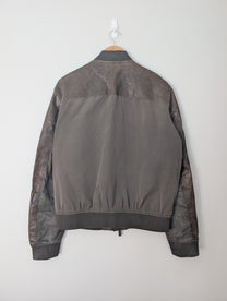 SĀN ARCHIVE GOODS Armani Jeans brown lambskin and polyester patchwork bomber jacket, back view.
